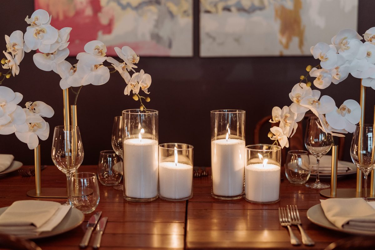 Styled candle and floral table